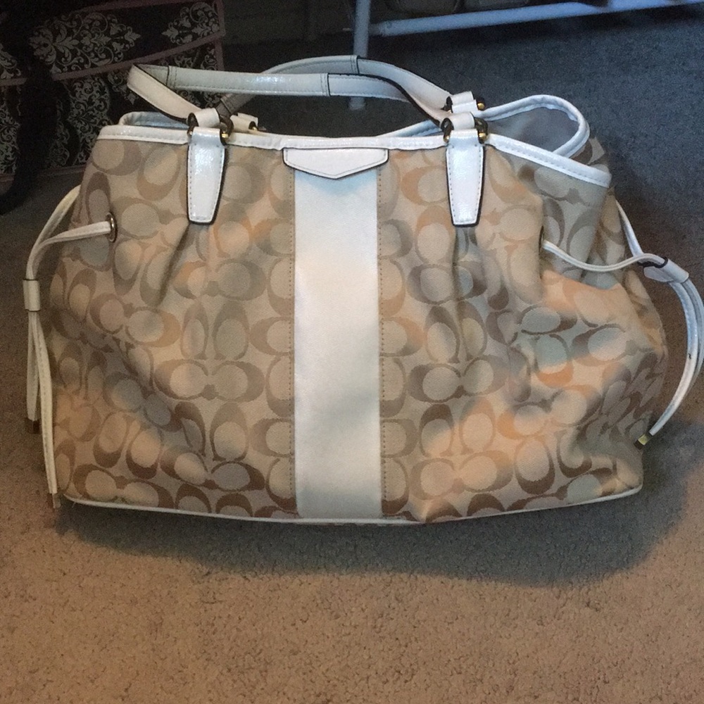 Beige and white Coach purse